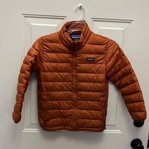 Burnt orange boys Patagonia coat.
